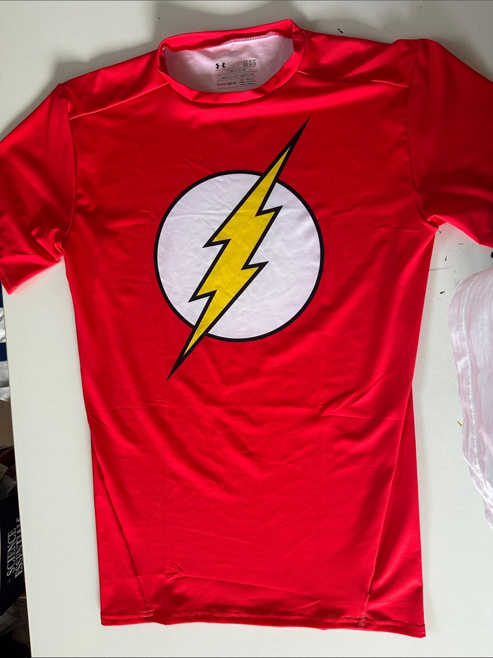 Under Armour Red Performance Tee with Yellow Lightning Emblem